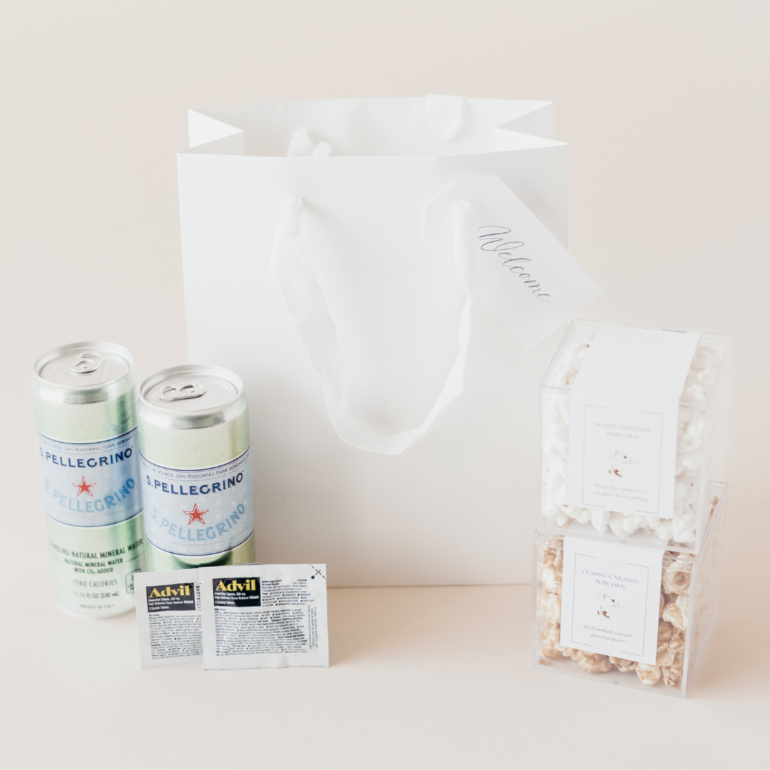 Minimalist wedding welcome bag with S.Pellegrino, artisan popcorn, and Advil by Lavender and Pine