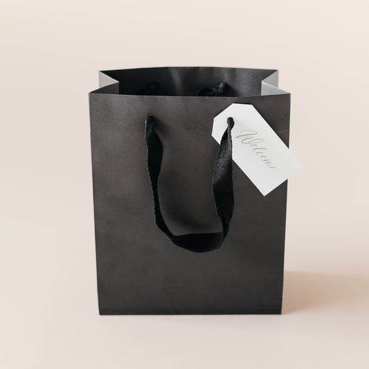 Welcome Bags: Black Gift Bag with Tag
