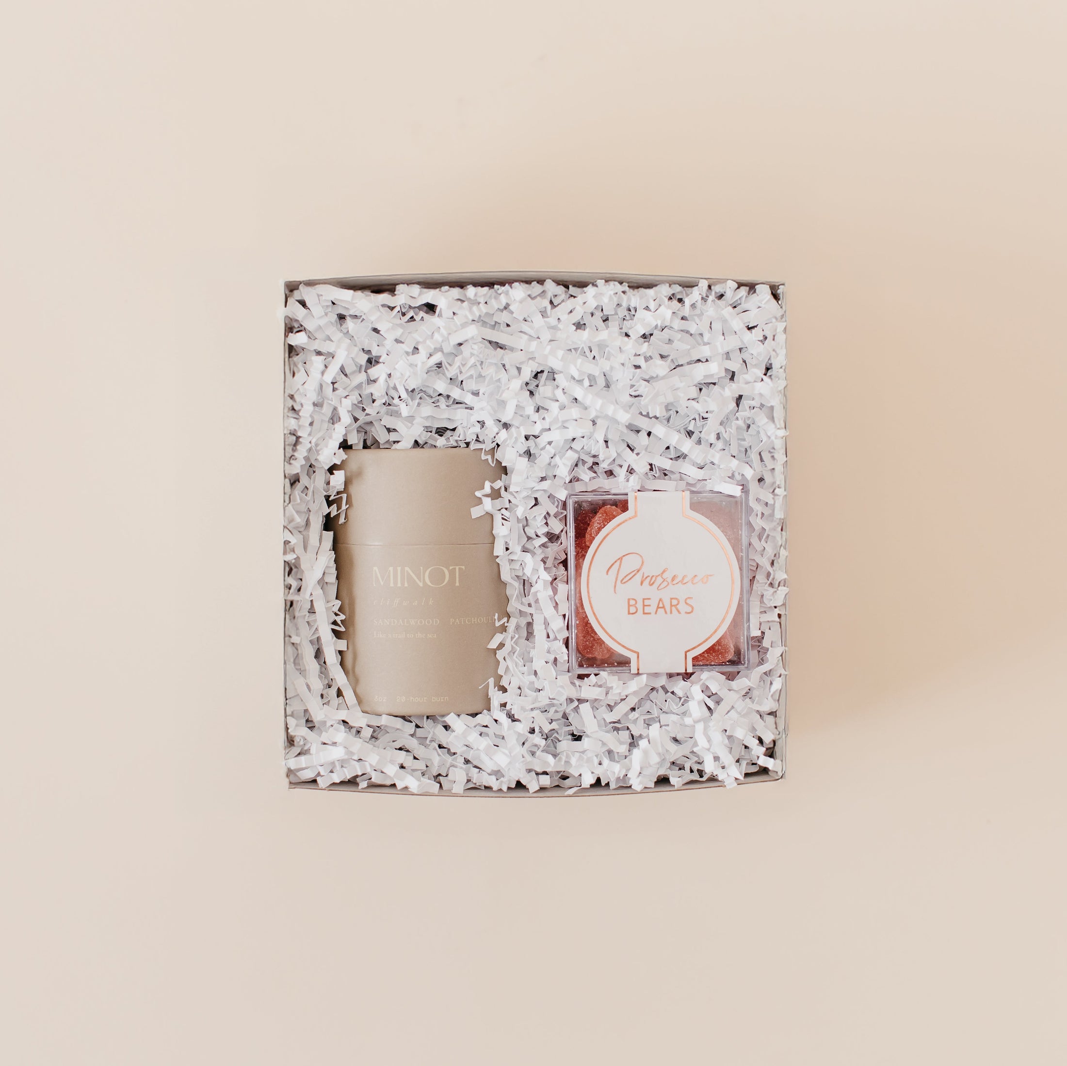 Lavender and Pine Bubbly and Glow Gift Box featuring Minot Cliffwalk candle and Prosecco Bears in mini white tuck top gift box