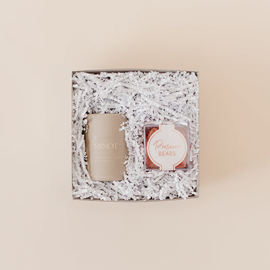 Lavender and Pine Bubbly and Glow Gift Box featuring Minot Cliffwalk candle and Prosecco Bears in mini white tuck top gift box