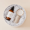Load image into Gallery viewer, Lavender and Pine I Do Gift Box overhead angle featuring Roote oat and honey botanical body lotion, Apricity Ceramics gold rim ring dish, and Minot candle in white round gift box
