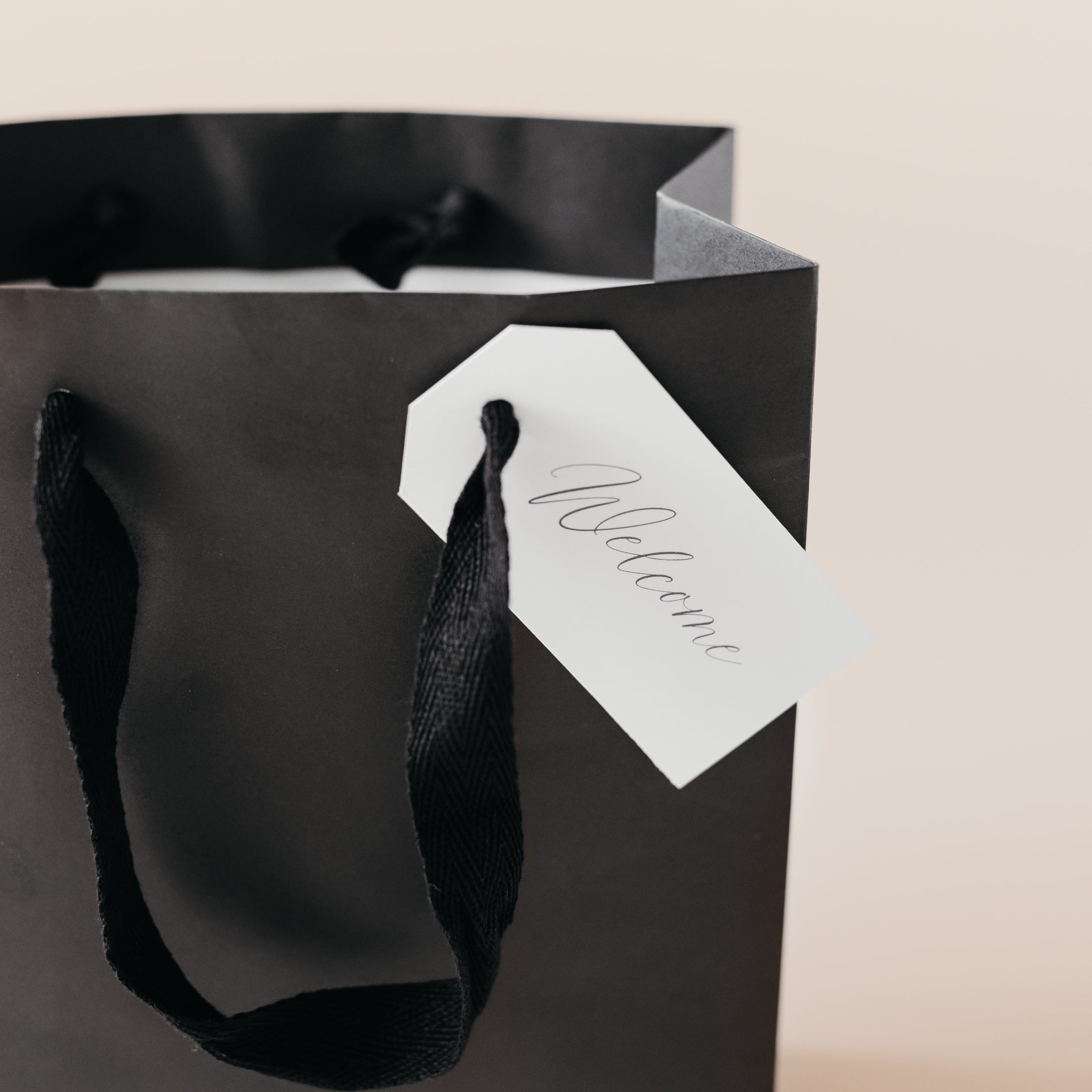 Welcome Bags: Black Gift Bag with Tag