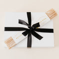 Load image into Gallery viewer, Lavender and Pine Pasta Gift Box wrapped in black satin ribbon with Bella Cucina bucatini pasta in white magnetic gift box
